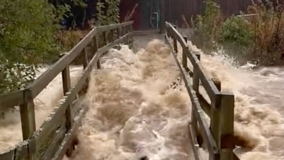 Overflowing River Storm Babet Barrels Through | WeatherBug