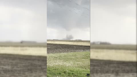 Tornado Spins Close to Road | WeatherBug
