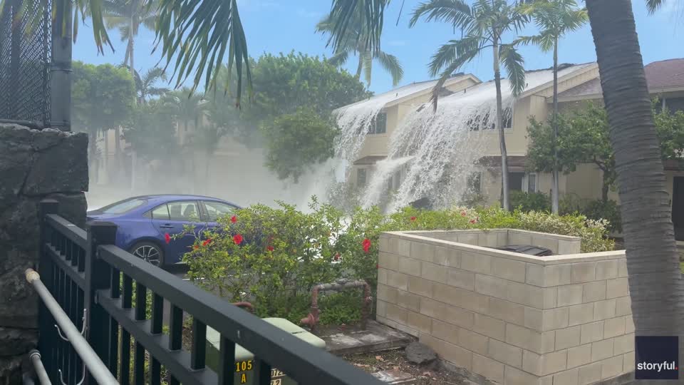 Massive Wave Crashes Over Rooftop in Hawaii | WeatherBug