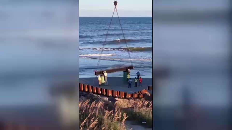 Surfers Catch Waves near Shoreline Project | WeatherBug